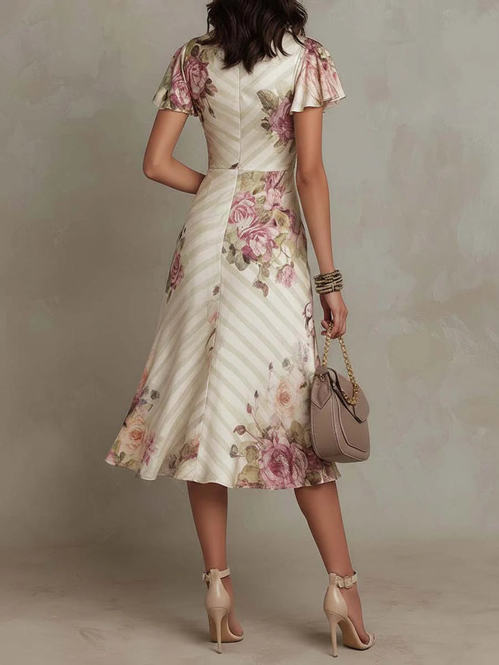 Alba™ | Elegant satin midi dress with a retro floral pattern 1
